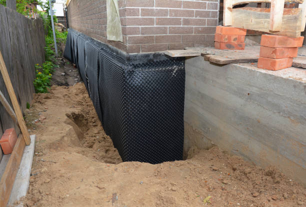 SJ Waterproofing Pros technician performing targeted Waterproofing assessment in Oneida, TN